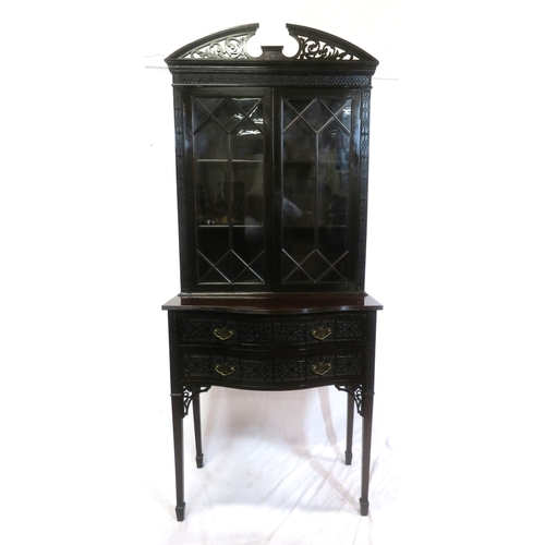 95 - Edwardian mahogany bookcase with domed pierced pediment, astragal glazed doors with shelved interior... 