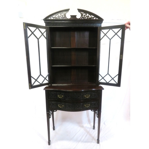 95 - Edwardian mahogany bookcase with domed pierced pediment, astragal glazed doors with shelved interior... 