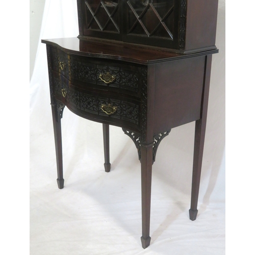 95 - Edwardian mahogany bookcase with domed pierced pediment, astragal glazed doors with shelved interior... 