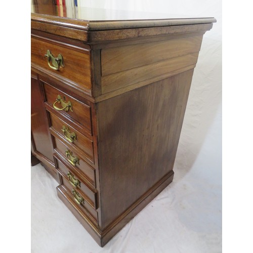 150 - Edwardian mahogany desk with pull-out bureau with drop down front and fitted interior, 10 side drawe... 