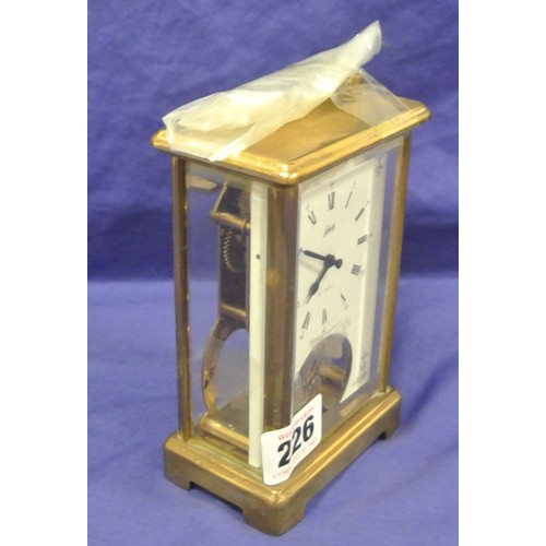 303 - Schatz brass cased German carriage clock with shaped handle