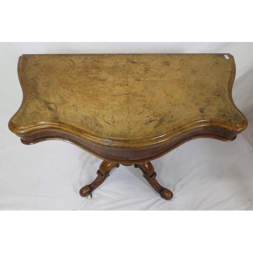 175 - Victorian walnut card table with serpentine shaped sides, swivel fold-over top, hexagonal baluster c... 