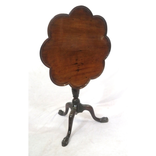 181 - Victorian mahogany table with tip-up top, scalloped borders, foliate carved baluster turned column, ... 