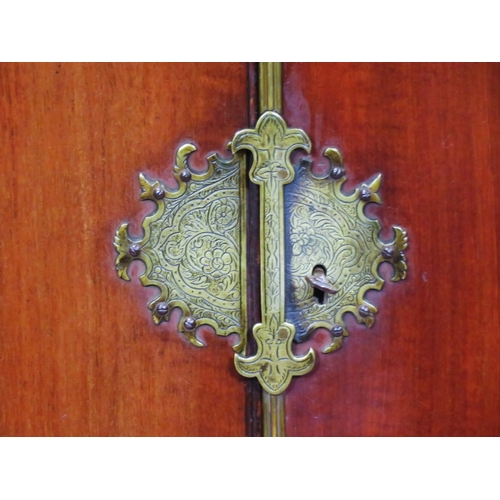 240 - Victorian mahogany chest on stand with ornate brass hinges & escutcheon, shelved interior, two drawe... 