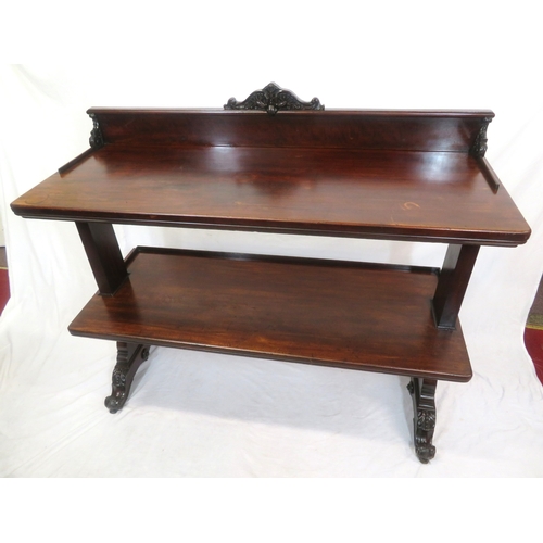 315 - Victorian mahogany three tier dumbwaiter with railed back, foliate carving, on scroll feet