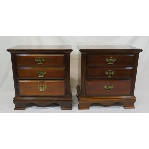 101 - Pair of mahogany side chests of three drawers with brass drop handles & pierced escutcheons, on brac... 