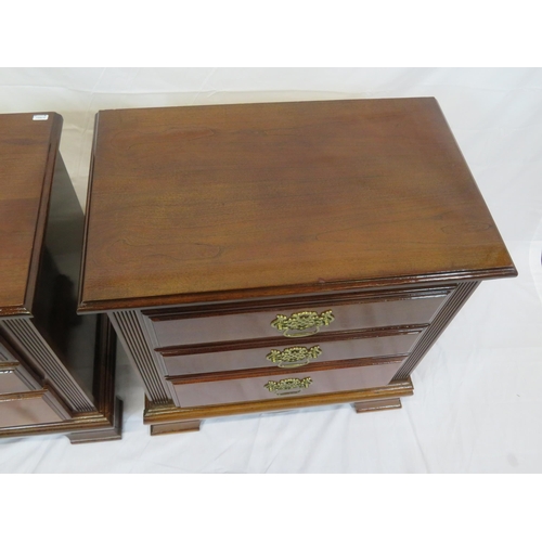 101 - Pair of mahogany side chests of three drawers with brass drop handles & pierced escutcheons, on brac... 