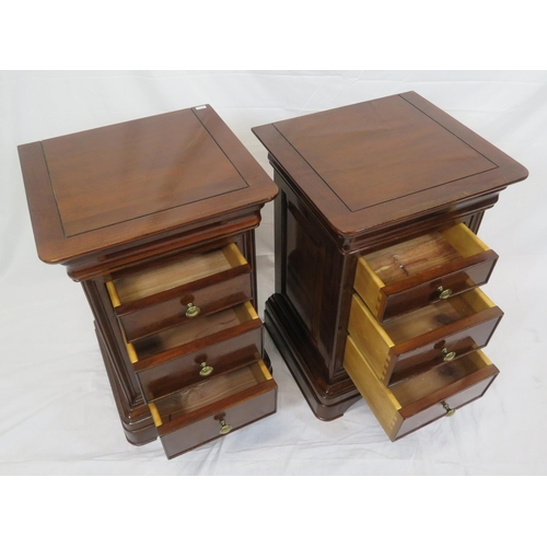 116 - Pair of mahogany bedside chests of three drawers each, with round handles, on carved bracket feet