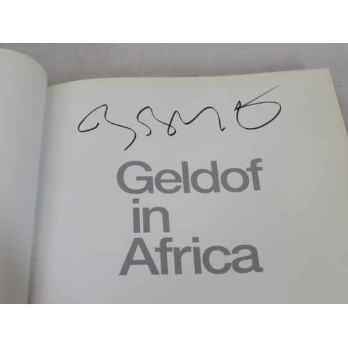 122 - 'Official Live Aid' book & 'Geldof in Africa' book, both signed