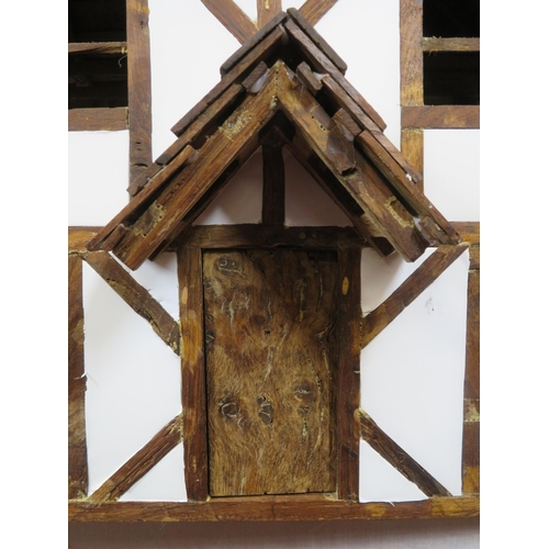 127 - Dutch style dolls house with sectioned interior and detachable roof