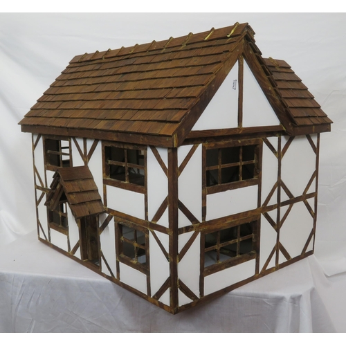 127 - Dutch style dolls house with sectioned interior and detachable roof