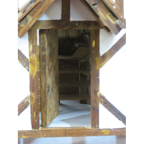 127 - Dutch style dolls house with sectioned interior and detachable roof