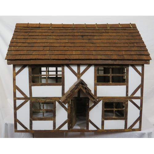 127 - Dutch style dolls house with sectioned interior and detachable roof