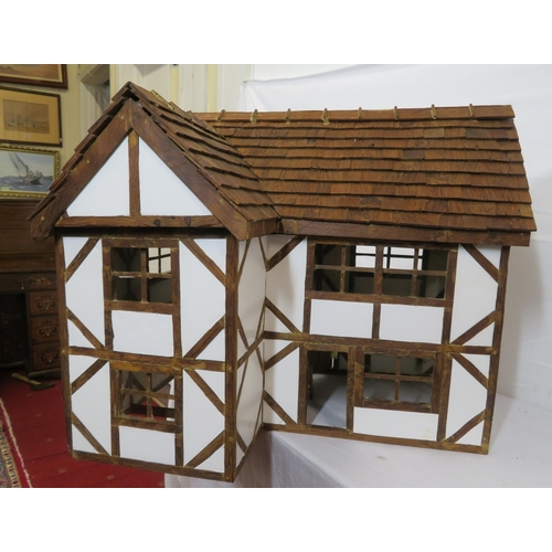 127 - Dutch style dolls house with sectioned interior and detachable roof