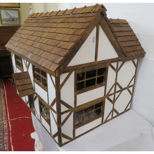 127 - Dutch style dolls house with sectioned interior and detachable roof