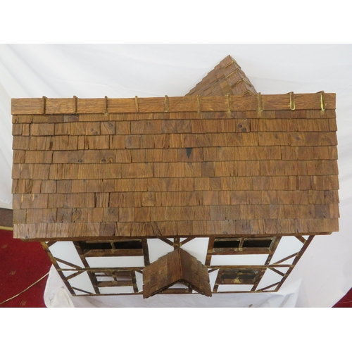 127 - Dutch style dolls house with sectioned interior and detachable roof