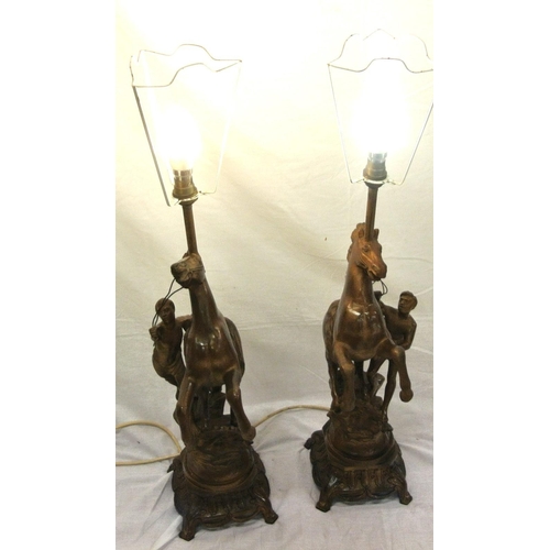 128 - Pair of Victorian style Spelter Marley horse & figure decorated electric table lamps with ornate bas... 