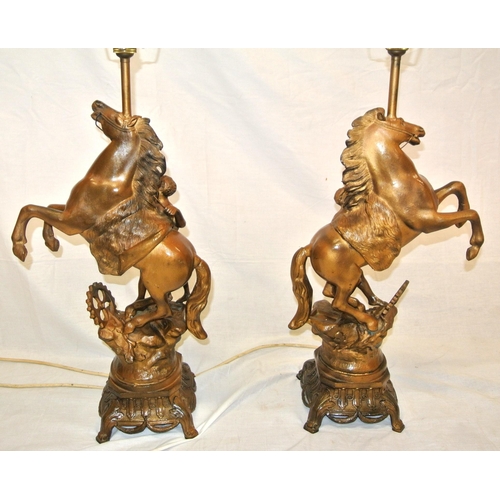 128 - Pair of Victorian style Spelter Marley horse & figure decorated electric table lamps with ornate bas... 