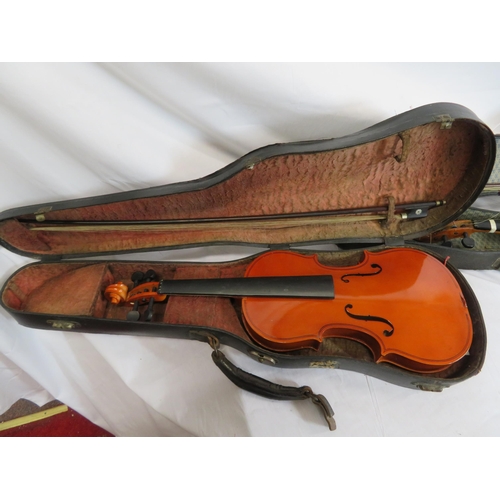 147 - Pair of yew violins in fitted carrying cases