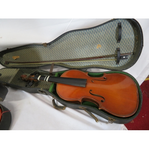 147 - Pair of yew violins in fitted carrying cases