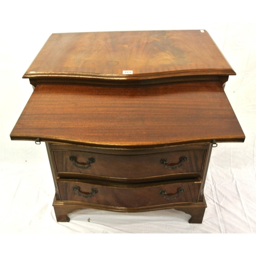 169 - Edwardian mahogany serpentine fronted bachelors chest of four drawers with pull-out shelf, drop hand... 