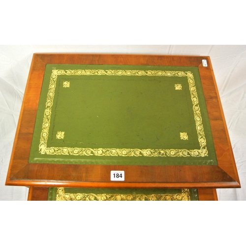 184 - Nest of three Edwardian style walnut tables with leatherette insets, on reeded legs