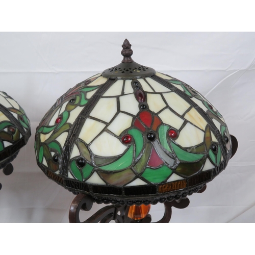 187 - Pair of Art Deco style electric table lamps with multi-coloured panelled shades, shaped columns & ro... 