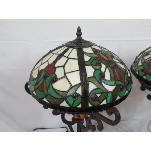 187 - Pair of Art Deco style electric table lamps with multi-coloured panelled shades, shaped columns & ro... 