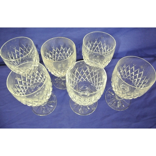 202 - Set of six Waterford Crystal cut glass white wine glasses with knop stems & round bases