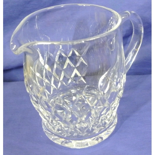 203 - Heavy Waterford Crystal baluster shaped ewer with shaped handle & diamond decoration