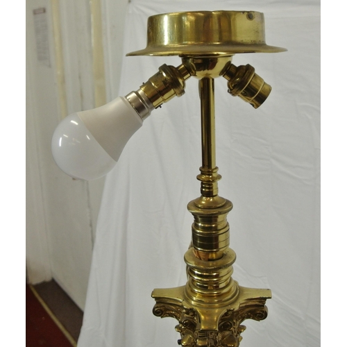 207 - Ornate brass electric standard lamp of adjustable height with Corinthian column & stepped base