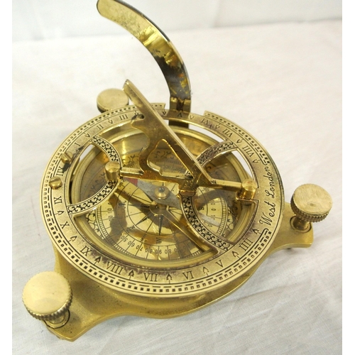 208 - Ornate brass compass with shaped gnomon, signed 'West, London' in presentation case