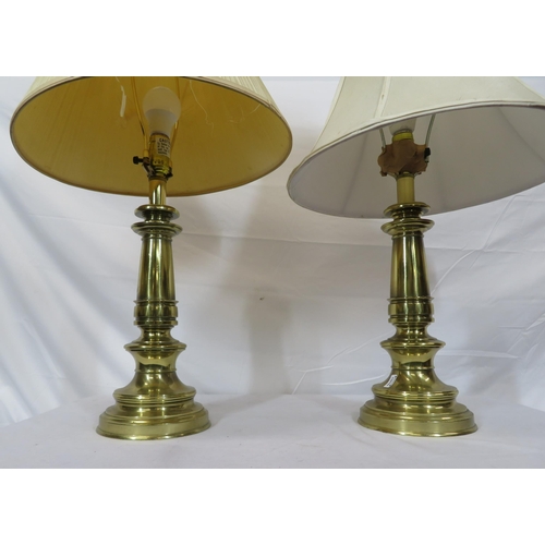 232 - Pair of round brass electric table lamps with stepped bases