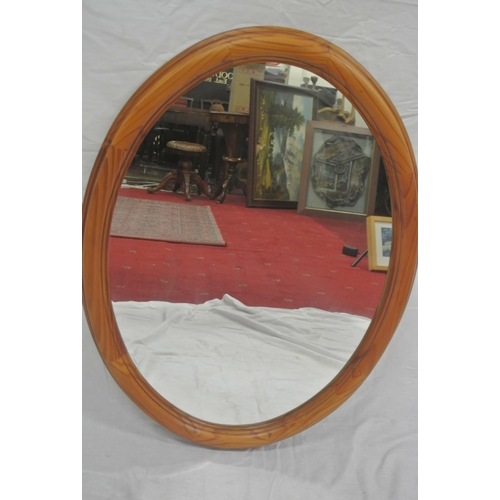 234 - Oval pine framed wall mirror 75x55cm