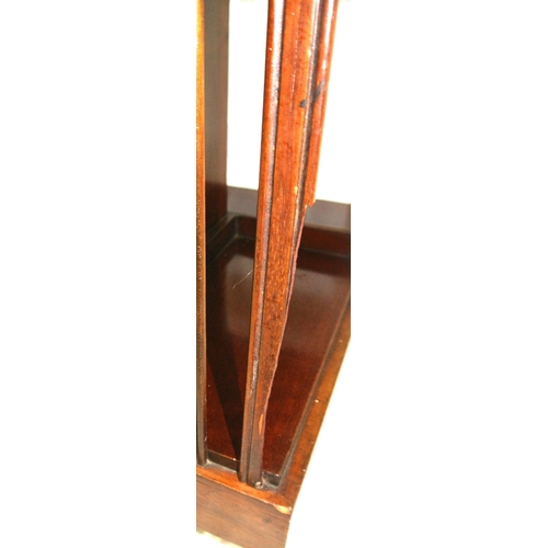 241 - Edwardian mahogany revolving bookcase with serpentine top, reeded rails, on quadrapod