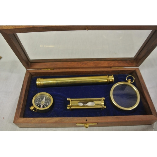 244 - Mariners brass presentation set in glazed case