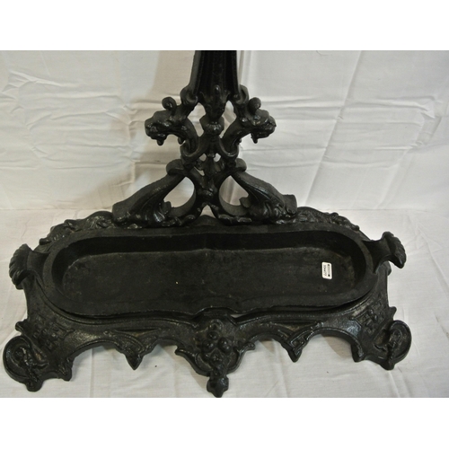 252 - Victorian design cast iron umbrella & stick stand with foliate decoration, & drip tray