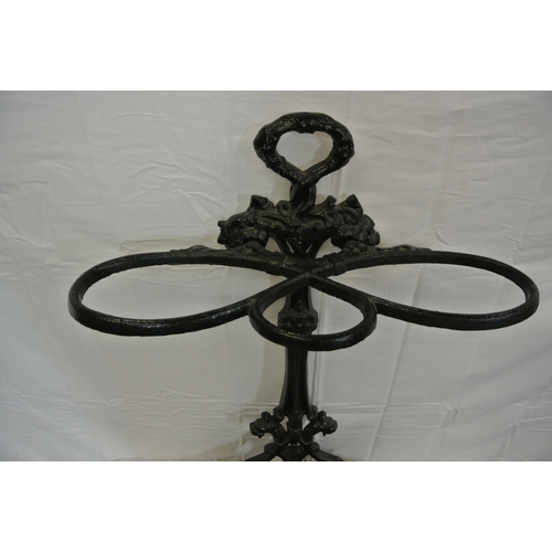 252 - Victorian design cast iron umbrella & stick stand with foliate decoration, & drip tray