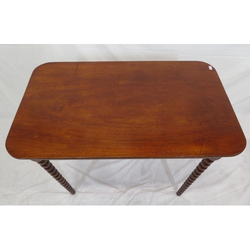 256 - Victorian mahogany oblong occasional table with rounded borders, raised on ball turned legs