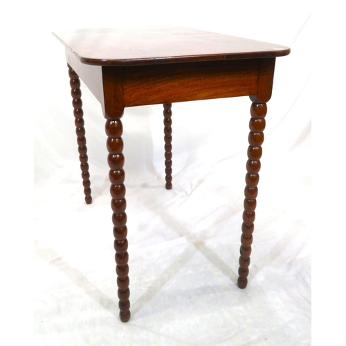 256 - Victorian mahogany oblong occasional table with rounded borders, raised on ball turned legs