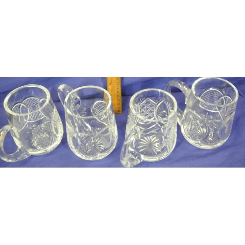 257 - Set of four Waterford cut glass tankards, cartouche & faceted decoration & shaped handles