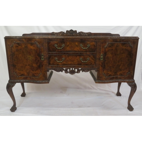 260 - Edwardian walnut serpentine fronted sideboard with scroll carved back & border, two bowed central dr... 