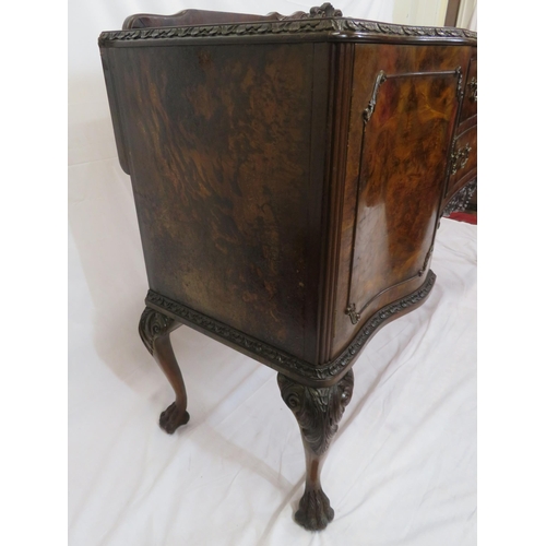 260 - Edwardian walnut serpentine fronted sideboard with scroll carved back & border, two bowed central dr... 