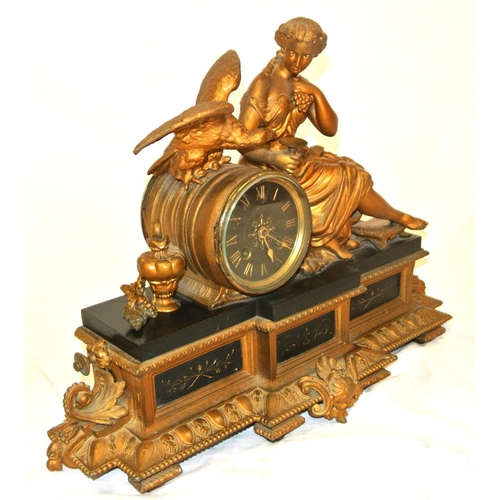 262 - French ormolu mantle clock with figure of a Lady with eagle & urn, circular brass framed dial, shape... 