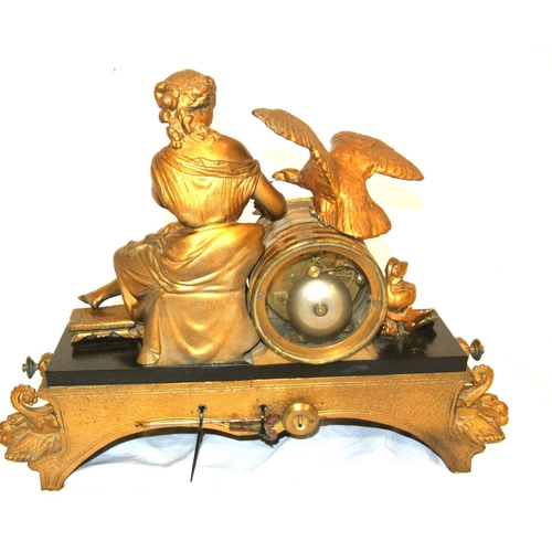 262 - French ormolu mantle clock with figure of a Lady with eagle & urn, circular brass framed dial, shape... 