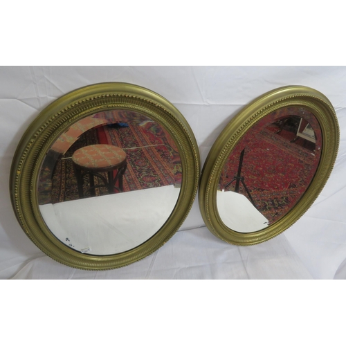 264 - Pair of Regency design oval bevelled glass wall mirrors with reeded & beaded decoration