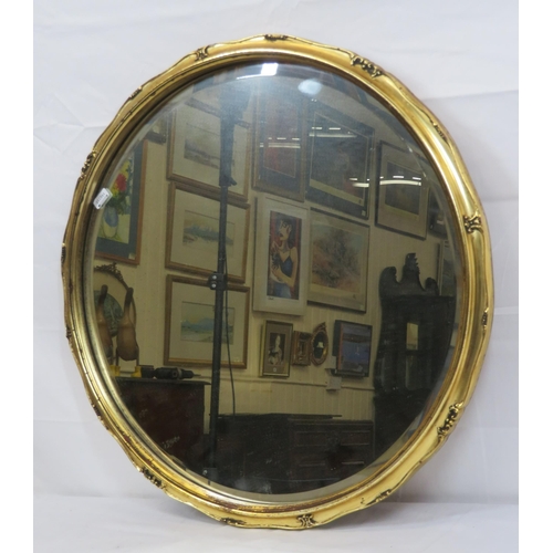 287 - Round design round bevelled glass wall mirror with scroll decorated frame 55x55cm