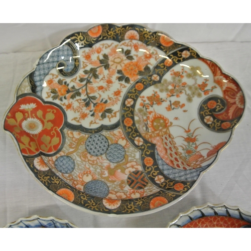 318 - Oval Imari dish with scalloped rim, gilt, deep blue & foliate decoration, & a pair of similar fish p... 