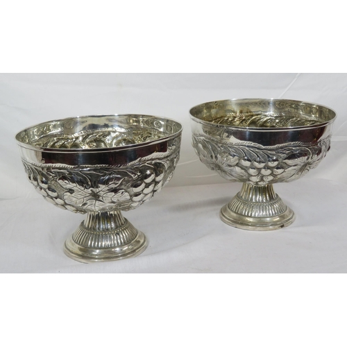 323 - Pair of round silverplated flower bowls with ornate grapevine embossing on spreading round bases