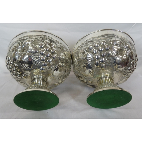 323 - Pair of round silverplated flower bowls with ornate grapevine embossing on spreading round bases